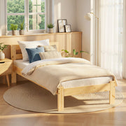 Einzelbett JANA aus Kiefer Massivholz in natur lackiert, Gesamtansicht mit Kopfteil und Fußteil im hellen Schlafzimmer.