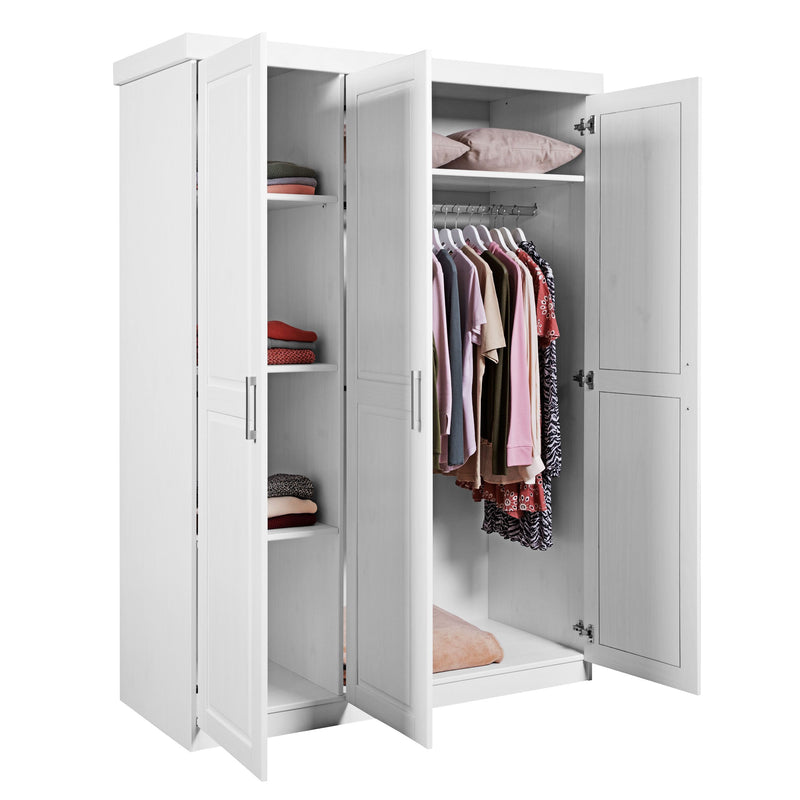 Kleiderschrank Magnus mit geöffneten Türen, Innenansicht mit Kleiderstange und Regalboden in weiß lackierter Kiefer.