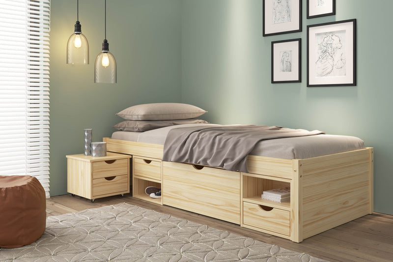 Funktionsbett Claas aus Kiefer massiv in Gesamtansicht mit ausziehbaren Schubladen und Stauraum unter der Liegefläche.
