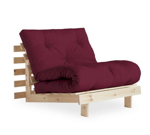 Schlafsofa ROOTS 90 cm mit Kiefer-Massivholzgestell, bordeauxrotem Bezug und aufgerollter Matratze in Gesamtansicht.