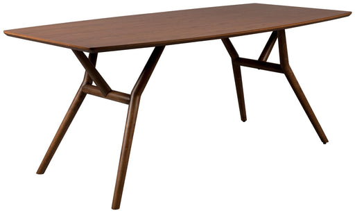 Esstisch MALAYA 180 x 90 cm mit Walnuss-Furnier-Tischplatte und geschwungenem Holzgestell in Gesamtansicht.