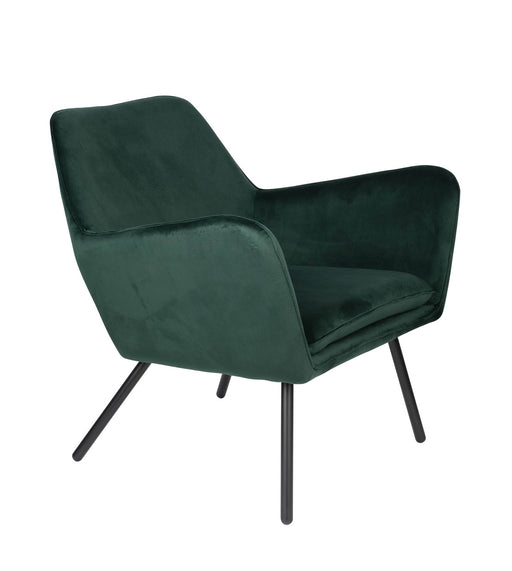 Retro Sessel BON Velvet Green in Grün mit geschwungener Rückenlehne und schwarzen Beinen in Gesamtansicht.