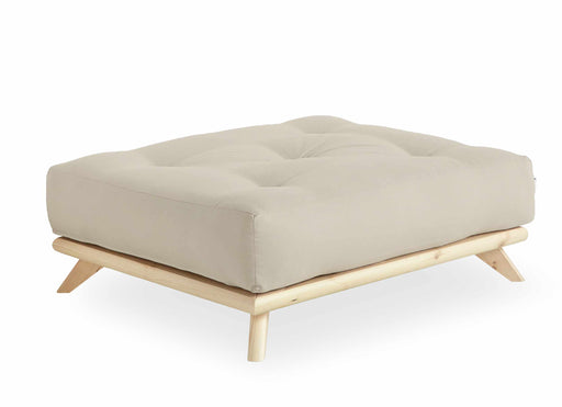 Hocker SENZA Polsterhocker mit beigem Polster und Kiefer-Gestell in Gesamtansicht von vorne.