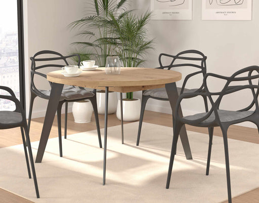 Runder Ausziehtisch TABLE ROUND mit Artisan-Eiche-Platte und schwarzen Beinen in Gesamtansicht mit gedecktem Tisch.