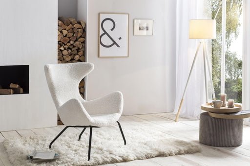 SalesFever Relaxsessel in Weiß mit geschwungenem Rückenlehnen-Design und schwarzen Metallbeinen in Gesamtansicht.