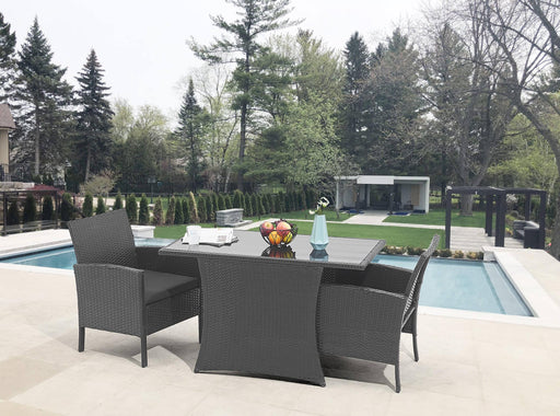 Garten Sitzgruppe Balkonset Polyrattan schwarz mit Tisch und Kissen in Gesamtansicht auf Poolterrasse.