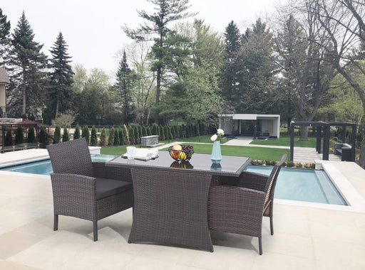 Garten Sitzgruppe Balkonset Polyrattan braun mit Tisch und Kissen in Gesamtansicht auf einer Poolterrasse.