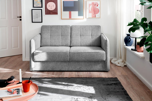 Schlafsofa Funktionssofa MILANO in Grau, Gesamtansicht frontal im hellen Wohnzimmer.