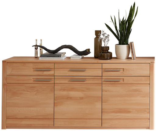 Sideboard NATURE ONE aus Kernbuche Massivholz mit drei Türen und zwei Schubladen in Gesamtansicht.