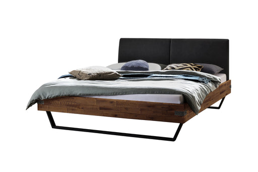 Hasena Bett EZZINO Akazie Vintage Brown mit schwarzem Polsterkopfteil und Metallrahmen, Gesamtansicht.