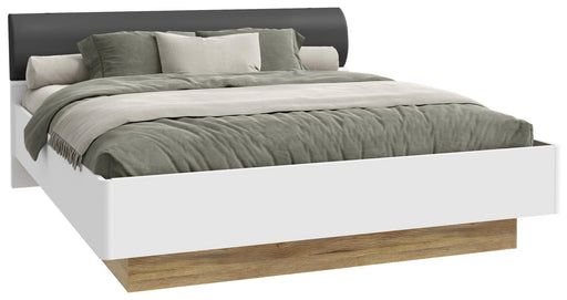 Doppelbett MAYACUS in Weiß mit Eiche-Sockel und grauem Polsterkopfteil, Gesamtansicht von vorn.