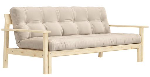 Schlafsofa UNWIND mit beigem Polster und Kieferholzrahmen in Gesamtansicht von der Seite.