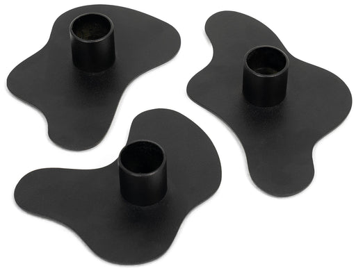 Gesamtansicht des Spinder MELT Kerzenhalter 3er-Set mit organisch geformten schwarzen Haltern und Kerzenöffnungen.