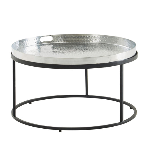 Couchtisch Hammerschlag Metall mit silberner Tabletop und schwarzem Metallgestell in Gesamtansicht.