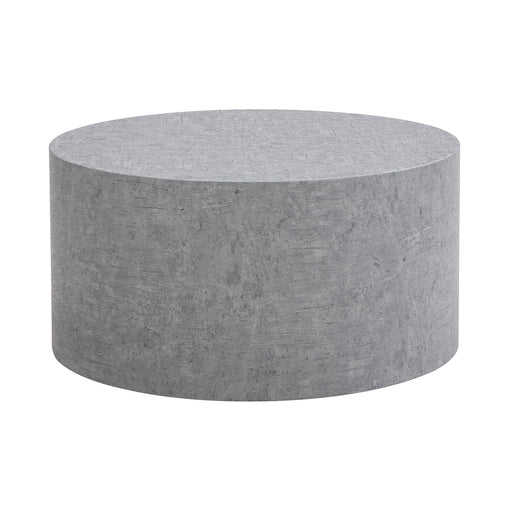Gesamtansicht des runden Couchtisch MONOBLOC in Beton-Optik Grau von vorne.