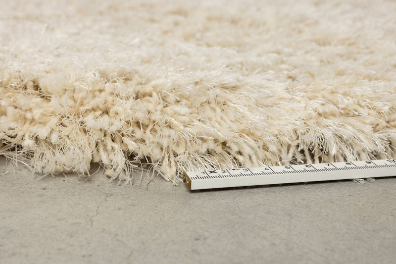 Wollteppich Tasty 200x290 Beige mit Hochflor im Wohnzimmer von Zuiver