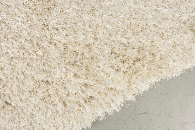 Wollteppich Tasty 200x290 Beige mit Hochflor im Wohnzimmer von Zuiver