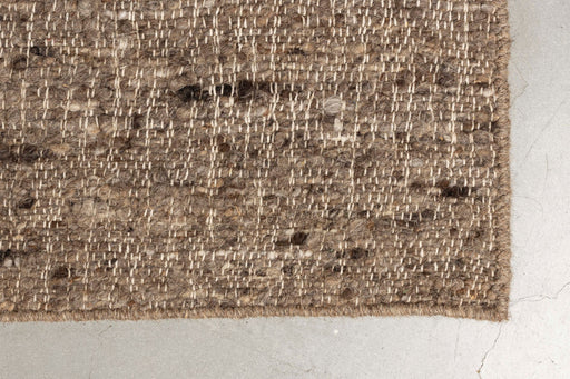Teppich Briton 160x230 Beige mit strukturiertem Wollgewebe in Nahaufnahme.
