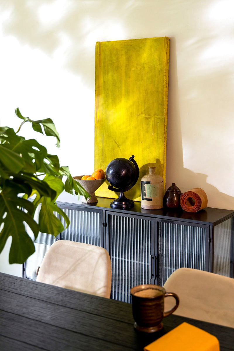 Sideboard Boli aus Glas und schwarzem Stahl von Dutchbone