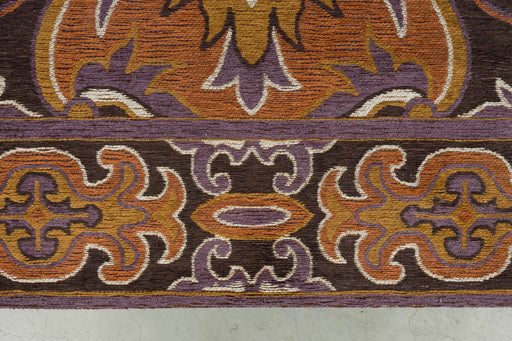 Teppich Bashmira 160x230 in Orange mit ornamentalem Muster in Braun, Orange und Violett, Detailansicht der Webstruktur.