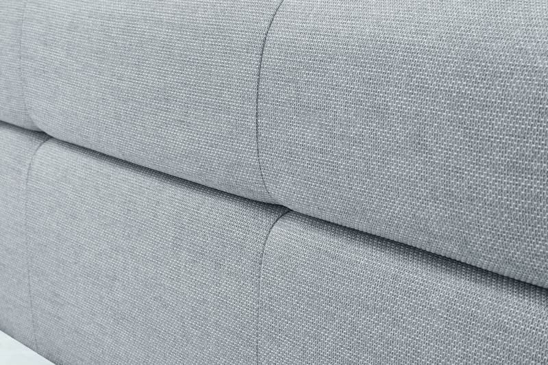 Polsterbett Lotte mit Bettkasten, gestepptem Kopfteil und Holzfüßen in Pastellblau – Ansicht 24