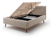 Polsterbett Lotte mit Bettkasten, gestepptem Kopfteil und Holzfüßen in Beige – Ansicht 13