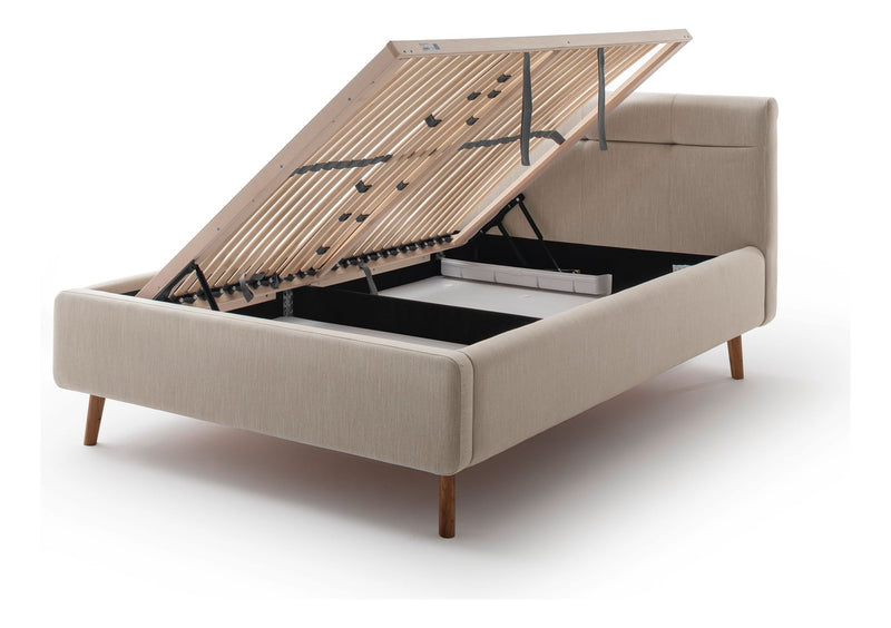 Polsterbett Lotte mit Bettkasten, gestepptem Kopfteil und Holzfüßen in Beige – Ansicht 13