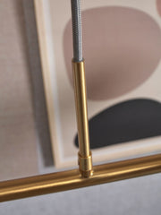 RoMi Hängeleuchte Carrara Glas Gold/Rauchglas, 6-flammig: Detail der goldenen Metallstange mit grauem Textilkabel