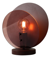 Runde Tischleuchte RoMi Toledo mit braunem Glasschirm, sichtbarer Glühlampe und dunklem Metallsockel.